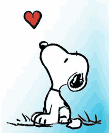 snoopy is sitting in the grass and looking up at a heart .