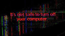 a computer screen displays a message that says `` it 's not safe to turn off your computer '' .