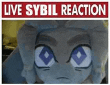 a picture of a cartoon character with blue eyes and the words `` live sybil reaction '' written above it .