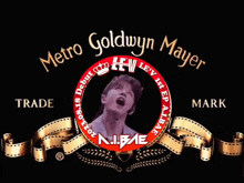 a metro goldwyn mayer logo with a man in the center