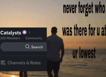 a man standing on a beach next to a sign that says " never forget who was there for u at "