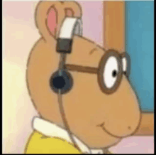 a close up of a cartoon character wearing headphones .