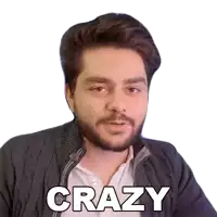 a man with a beard is wearing a jacket and has the word crazy on his face