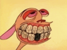 a close up of a cartoon character 's face with a big mouth and teeth .