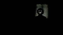 a shadow of a person with a smiling face in the dark