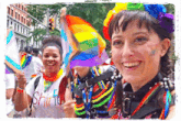 a woman wearing a shirt that says " shine " smiles while holding a rainbow flag