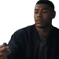 a man in a black jacket is pointing a gun at the camera