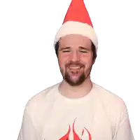a man with a beard wears a santa hat