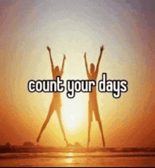 a picture of two people jumping in the air with the words count your days below them