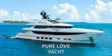 a large white yacht in the ocean with the words pure love yacht on the bottom