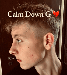 a picture of a young man with the words calm down g