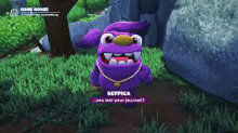 a purple monster with a necklace around its neck is standing in the grass .