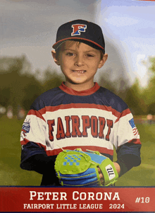 a young boy wearing a fairport little league uniform