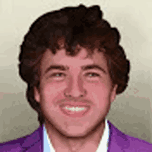 a young man is wearing a purple jacket and smiling .