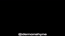 a black background with the words `` demonshyne '' written in white on it .