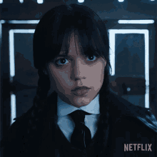 a girl with pigtails and a netflix logo on the bottom right