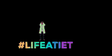 a man in a lab coat is standing in front of the words #lifeatiet