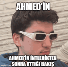 a man wearing sunglasses with a caption that says ahmed ' in