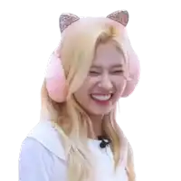 a woman wearing a pair of pink cat ear muffs smiles with her eyes closed