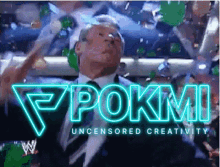 a man in a suit and tie stands in front of a neon sign that says pokmi