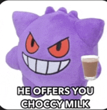 a purple stuffed animal with red eyes is holding a cup of chocolate milk .