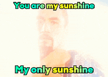 a picture of a man with the words " you are my sunshine my only sunshine " below it