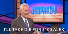 a man in a suit and tie on a jeopardy set