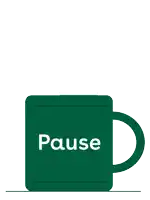 a green coffee mug with the word pause written on it