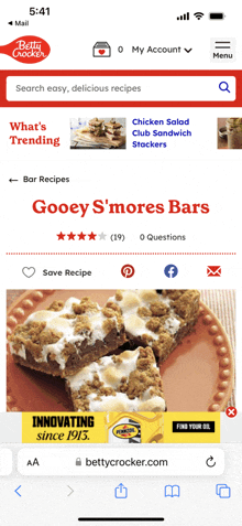 a phone screen shows a betty crocker website