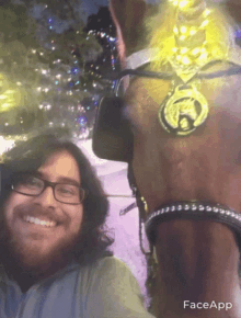 a man taking a selfie with a horse with a face app watermark on the bottom