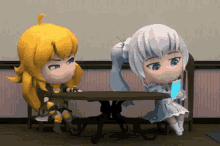 a couple of anime characters are sitting at a table with a book .