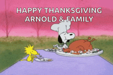 a cartoon of snoopy and woodstock sitting at a table eating a turkey .