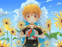 a boy in a black shirt is holding a volleyball in a field of sunflowers