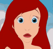 a close up of a cartoon character with red hair