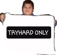 a young boy is holding a sign that says tryhard only