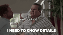 a man in a striped shirt says pay conditions