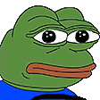 a green frog with big eyes and a big mouth is wearing a blue shirt and looking at the camera .