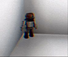 a person standing in a corner of a room