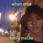a woman wearing a hat with the words " when eres fosi y mateo " on the bottom