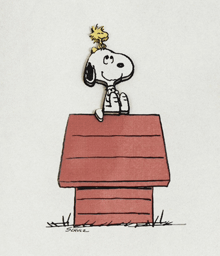 a drawing of snoopy and woodstock sitting on top of a red doghouse