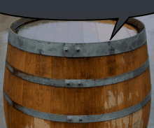 a wooden barrel with a speech bubble behind it