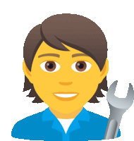 a man in a blue shirt holds a wrench