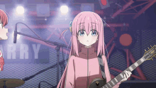 a girl with pink hair is holding a guitar in front of a sign that says " erry "