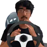 a man with glasses and a mustache holds a steering wheel