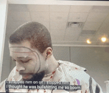 a man with blood on his face is on a screen with the words " i thought he was bullshitting me so boom " at the bottom