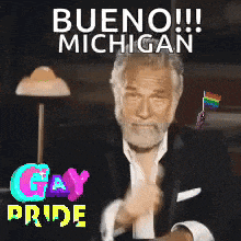 a man in a suit giving a thumbs up with the words bueno michigan above him