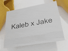 a piece of paper that says kaleb x jake