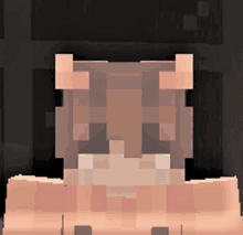 a pixel art of a person 's face with the letter t on it