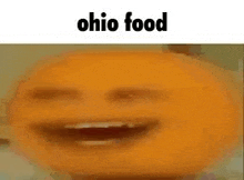 a close up of an orange with a smiley face and the words `` ohio food '' above it .