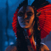 a close up of a person 's face with feathers on it